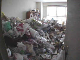 Hoarding bedroom before